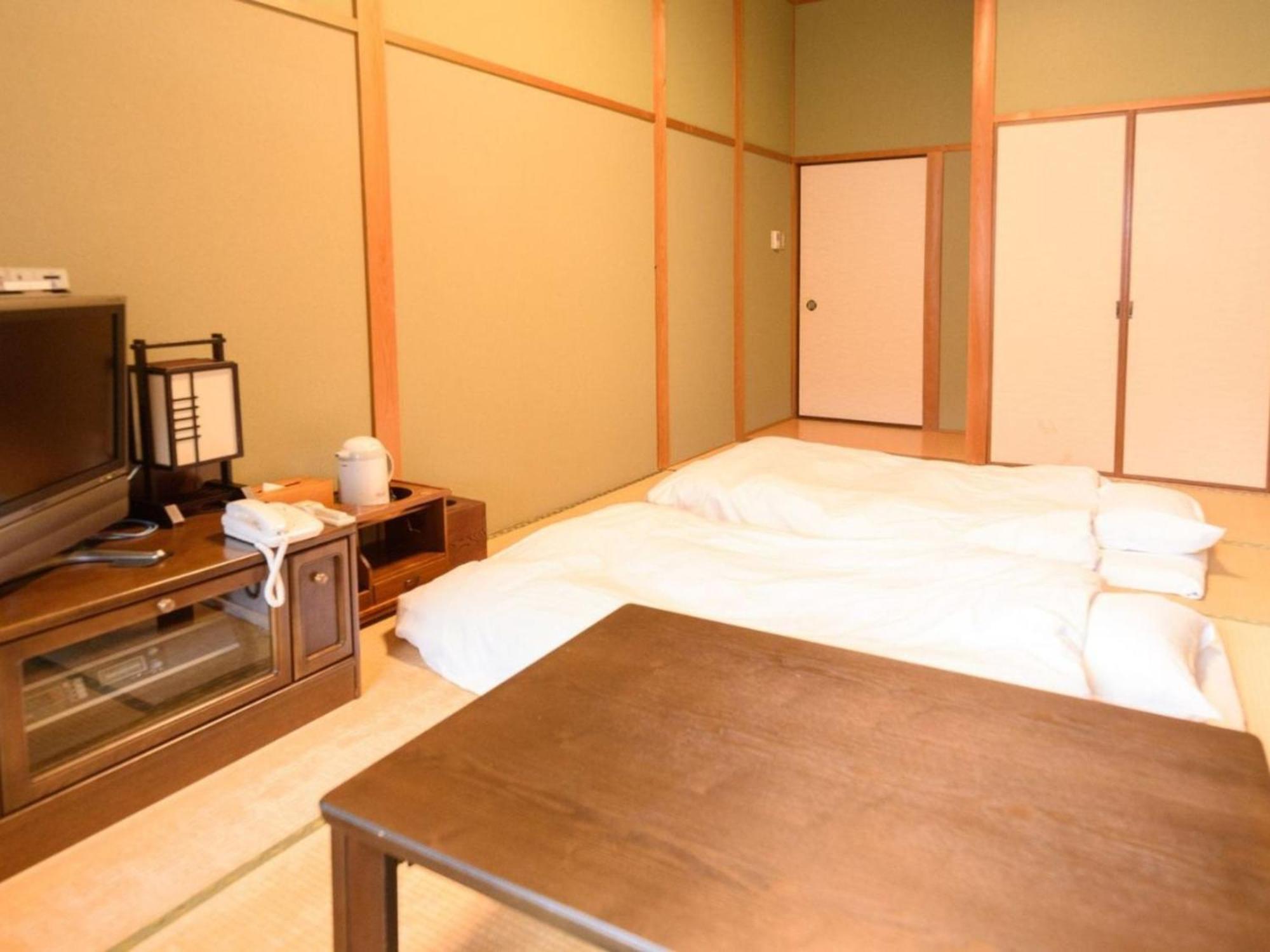 Business Hotel Kawakami كومانو المظهر الخارجي الصورة