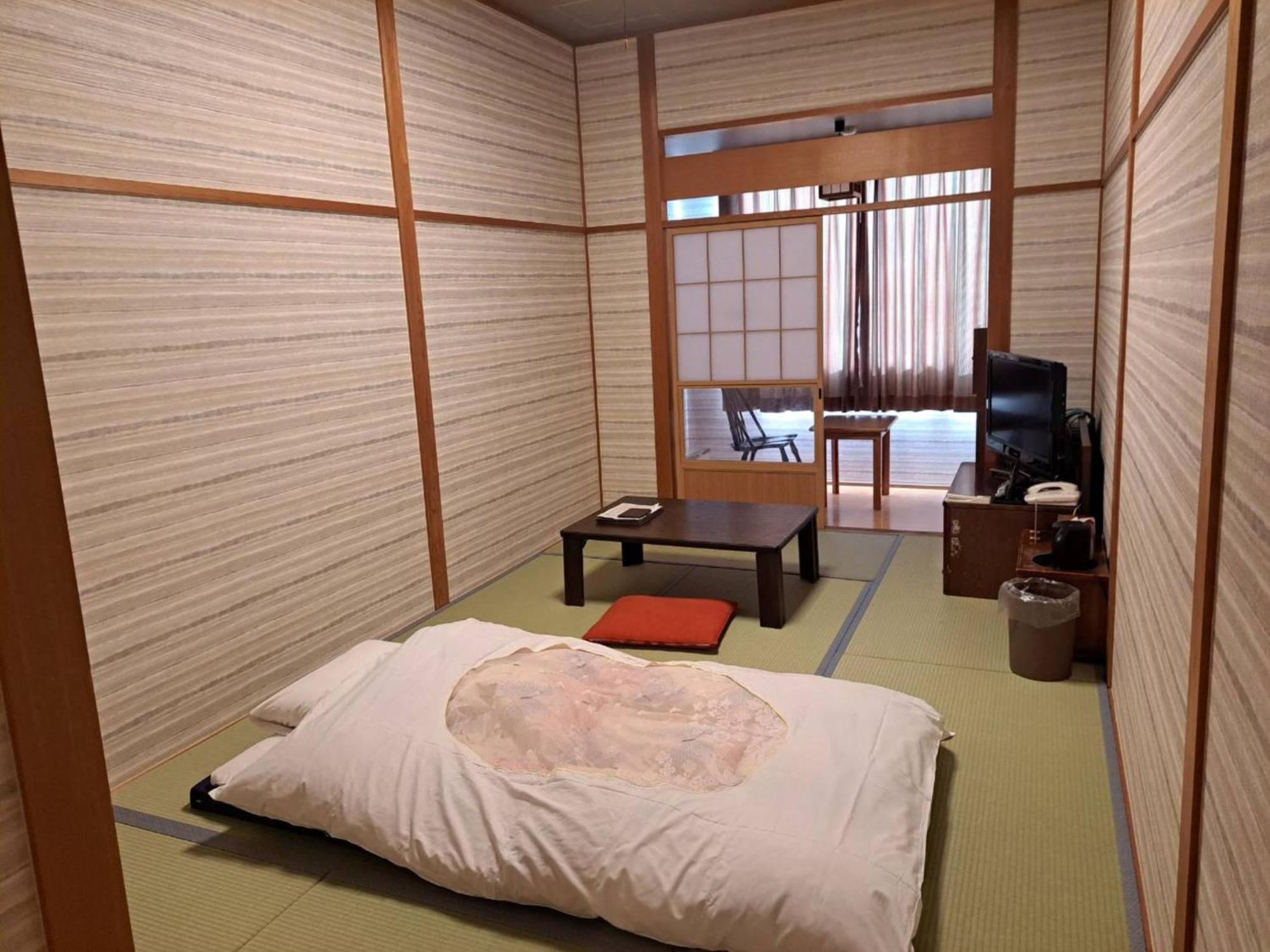 Business Hotel Kawakami كومانو المظهر الخارجي الصورة