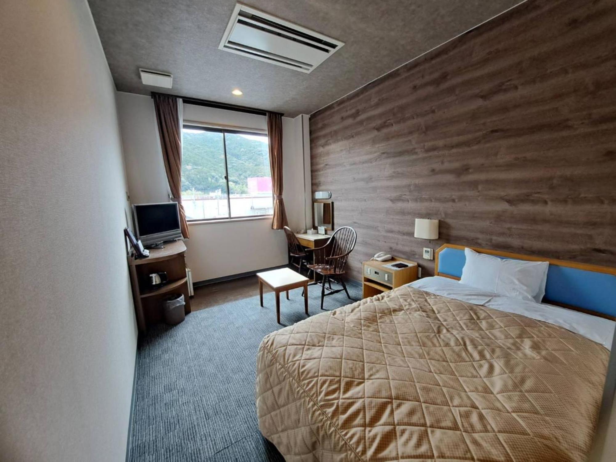 Business Hotel Kawakami كومانو المظهر الخارجي الصورة
