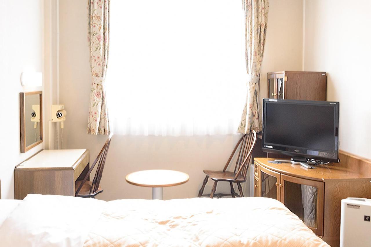 Business Hotel Kawakami كومانو المظهر الخارجي الصورة