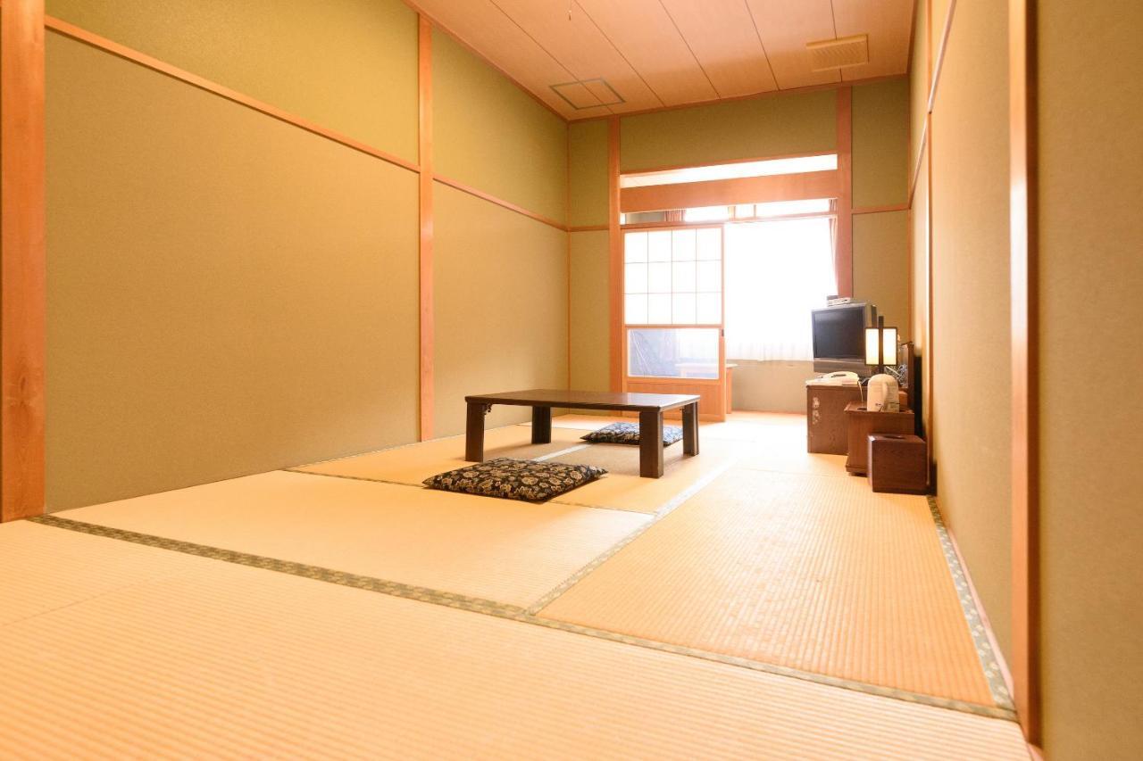 Business Hotel Kawakami كومانو المظهر الخارجي الصورة