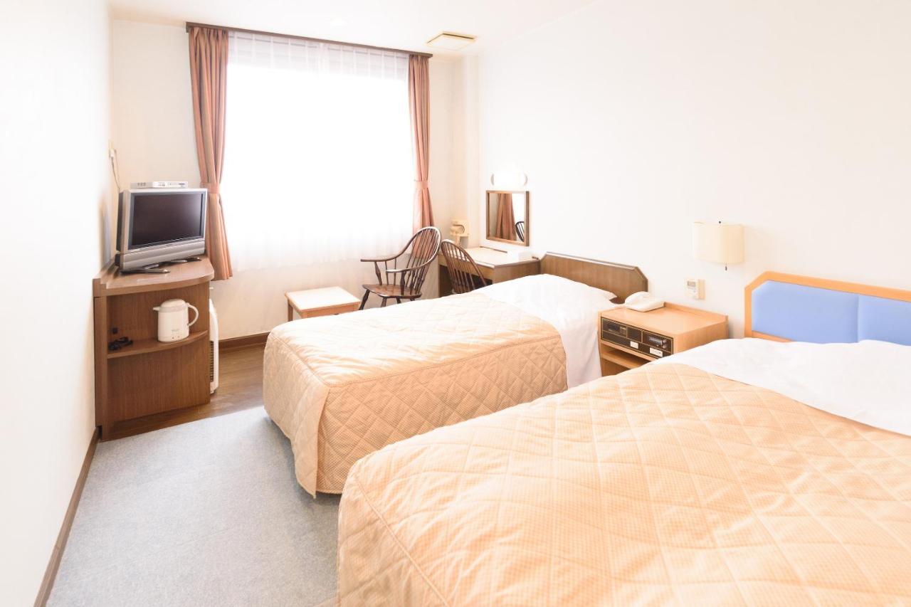Business Hotel Kawakami كومانو المظهر الخارجي الصورة