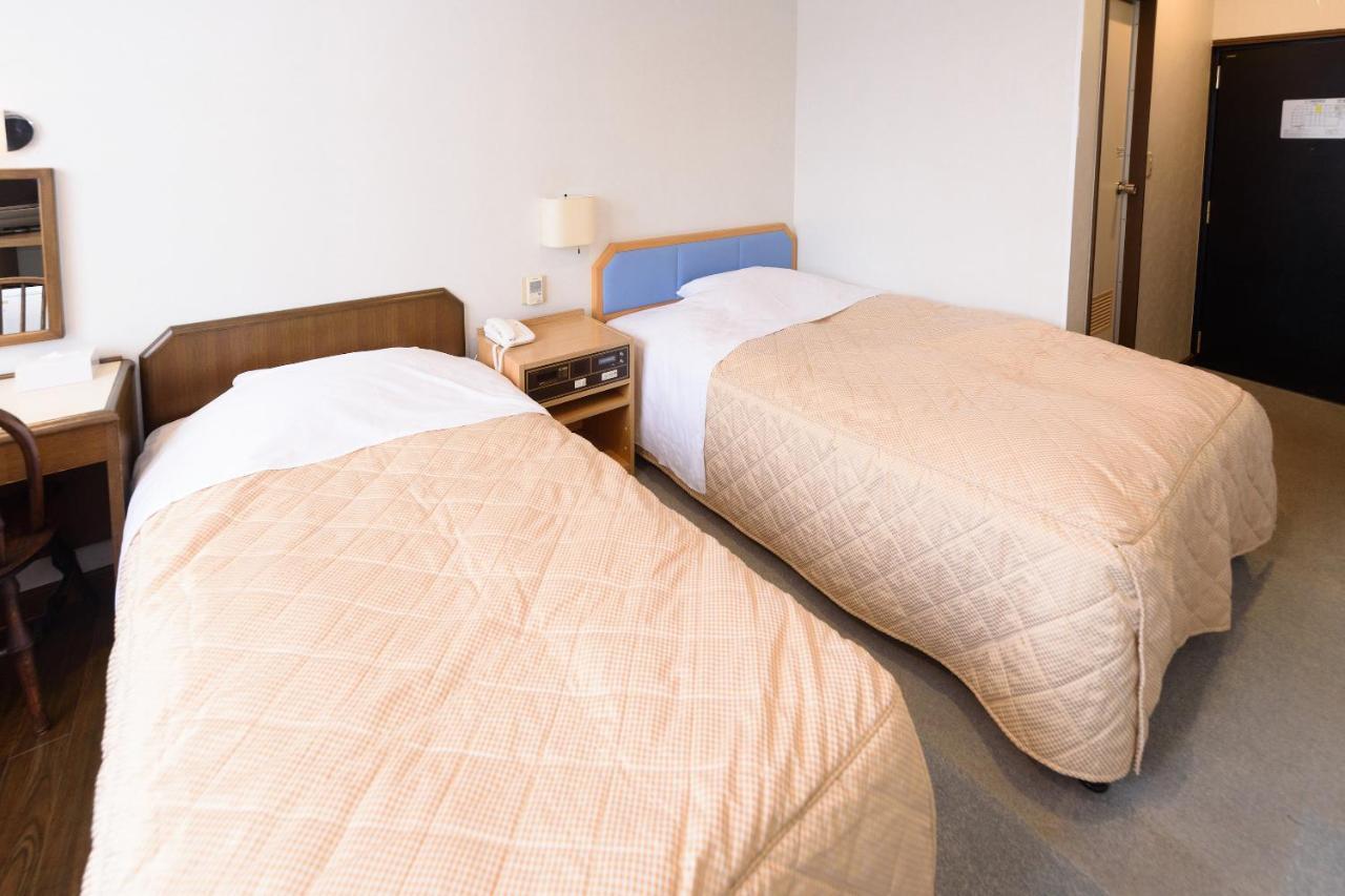 Business Hotel Kawakami كومانو المظهر الخارجي الصورة