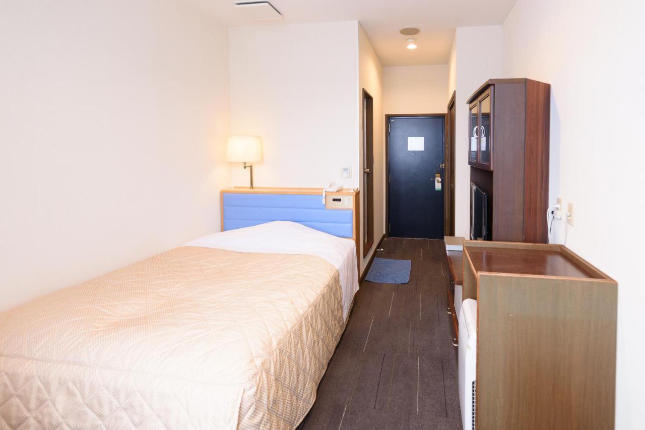 Business Hotel Kawakami كومانو المظهر الخارجي الصورة