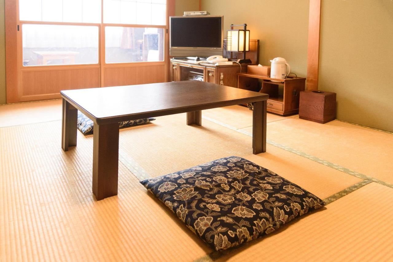 Business Hotel Kawakami كومانو المظهر الخارجي الصورة
