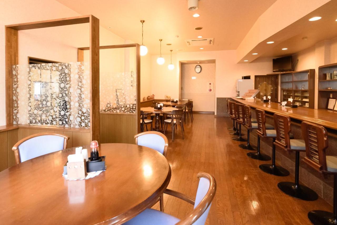 Business Hotel Kawakami كومانو المظهر الخارجي الصورة