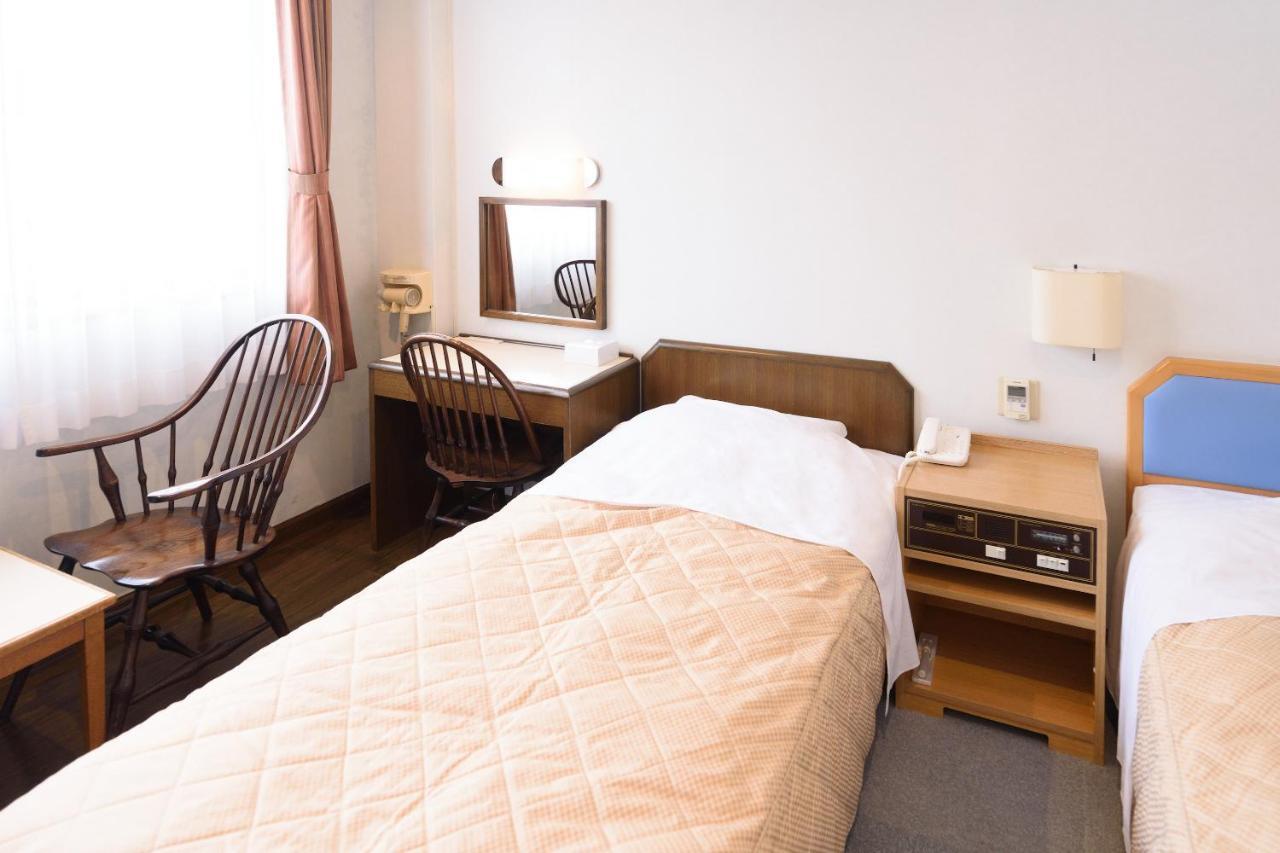 Business Hotel Kawakami كومانو المظهر الخارجي الصورة