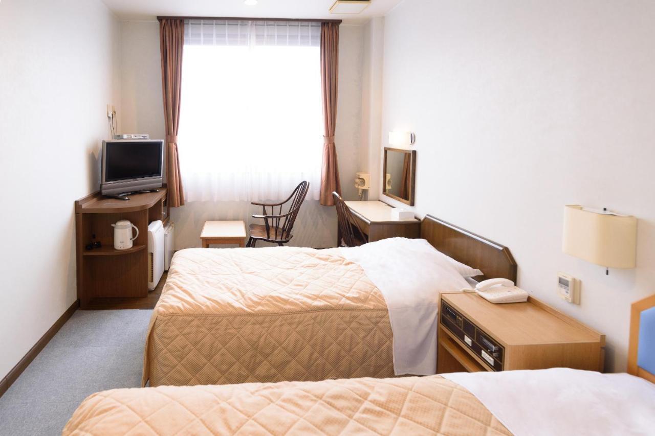 Business Hotel Kawakami كومانو المظهر الخارجي الصورة