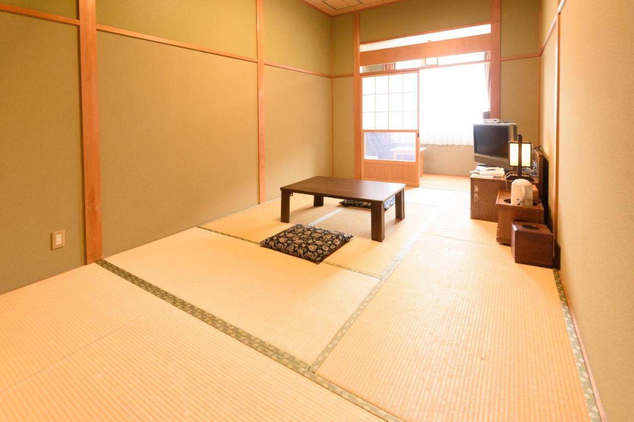 Business Hotel Kawakami كومانو المظهر الخارجي الصورة