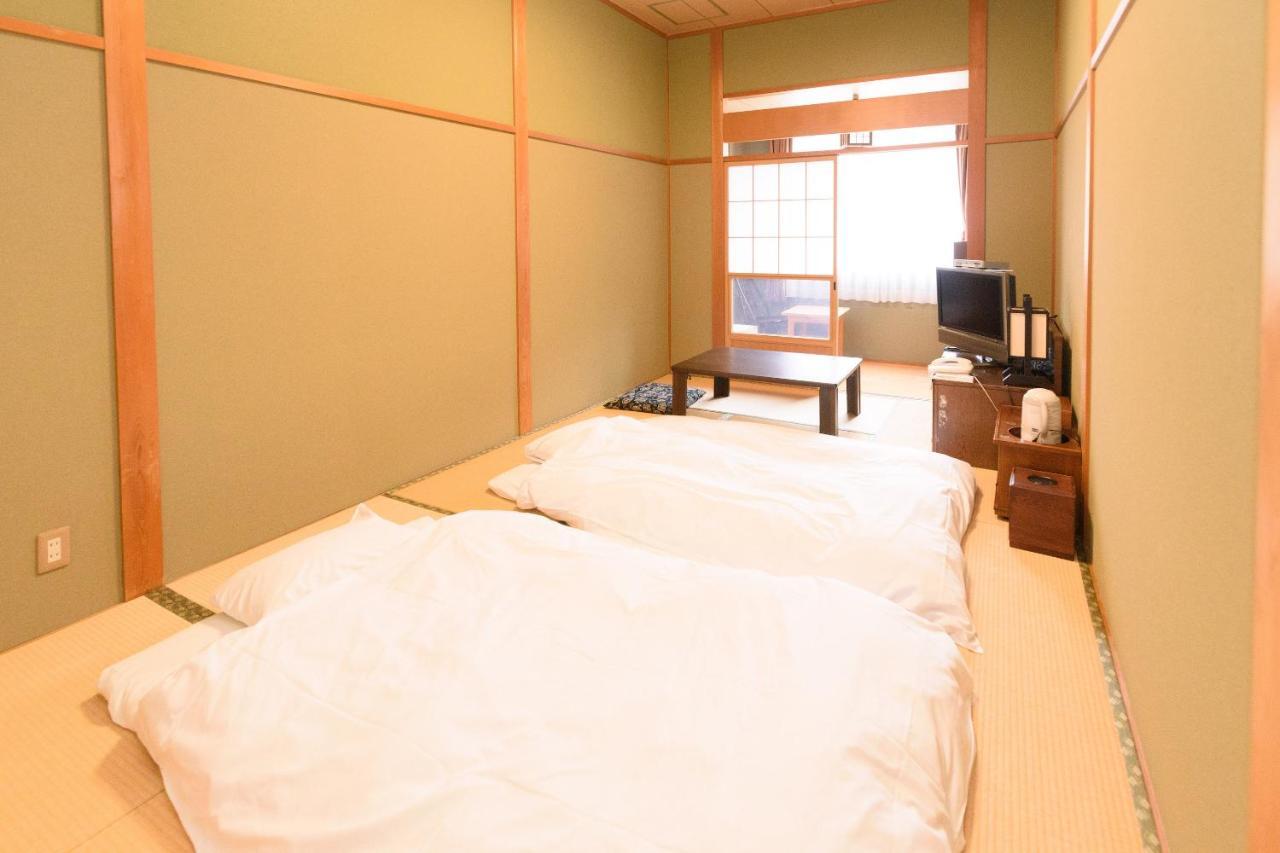Business Hotel Kawakami كومانو المظهر الخارجي الصورة