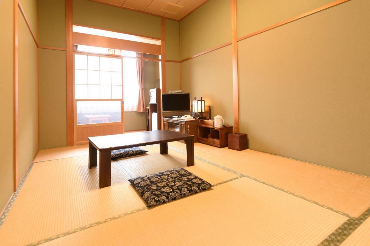Business Hotel Kawakami كومانو المظهر الخارجي الصورة